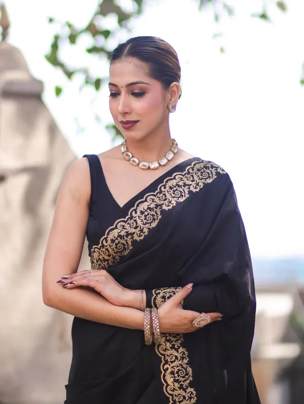 Elegant_Black_Saree_with_Golden_Floral_Border
