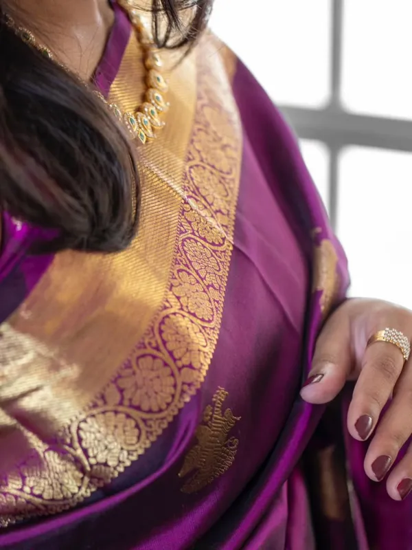 Royal_Purple_Designer_Saree_with_Golden_Zari_Border_&_Traditional_Motifs
