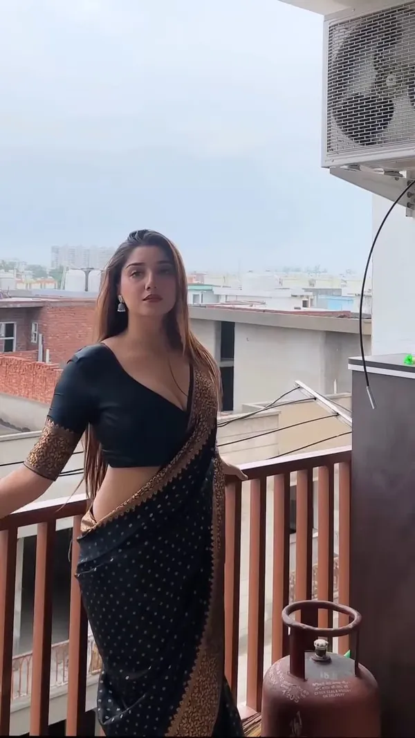 Women’s_Black_Printed_Saree_with_Designer_Border_&_Matching_Blouse