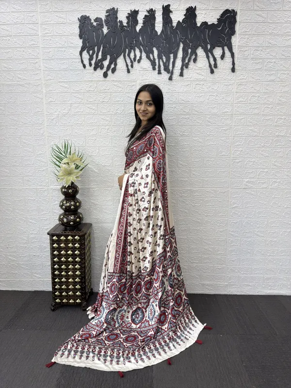 Womens_Premium_White_Ajrakh_Printed_Cotton_Blend_Saree_With_Designer_Border_And_Tassel_Pallu_And_Mirror_Work