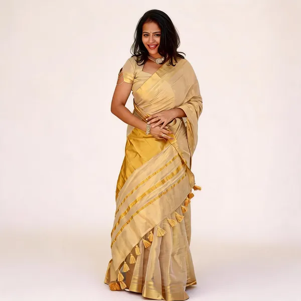 Women's_Off_White_Kerala_Kasavu_Tissue_Silk_Saree_with_Golden_Zari_Border_&_Tassel_Pallu_|_Traditional_Onam,_Vishu_&_Wedding_Wear_Saree