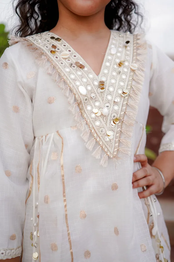 Classy_ivory_white_kurti_and_palazzo_set_for_girls,_hand_crafted_design,_festive_wear