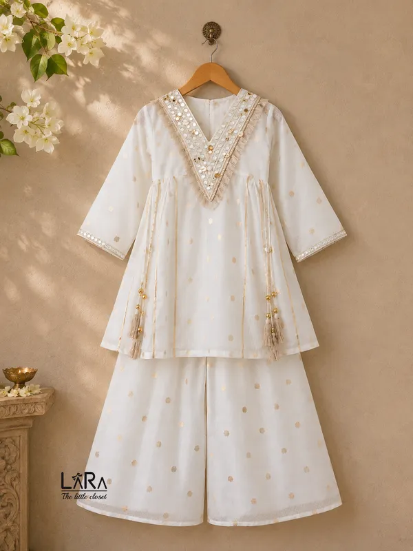 Classy_ivory_white_kurti_and_palazzo_set_for_girls,_hand_crafted_design,_festive_wear