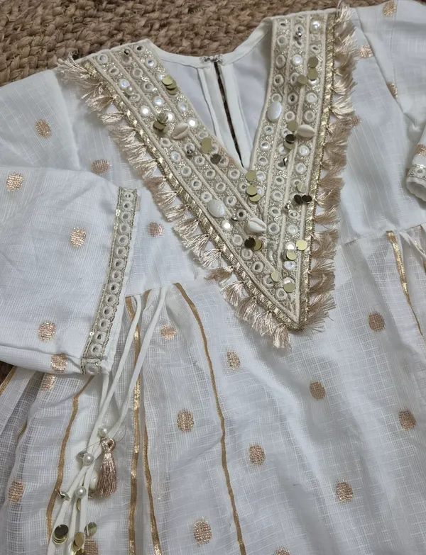 Classy_ivory_white_kurti_and_palazzo_set_for_girls,_hand_crafted_design,_festive_wear