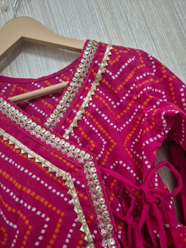 Dark_pink_cotton_angrakha_style_kurti_and_dhoti_set_for_little_girls__