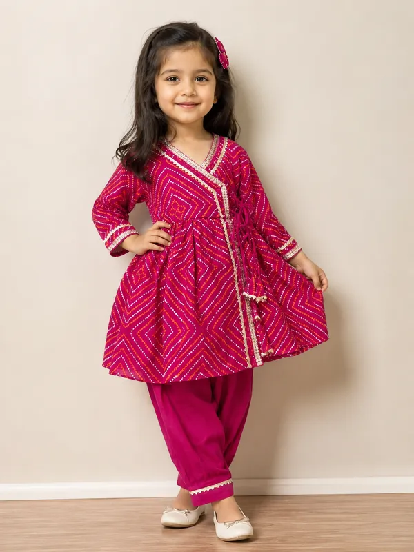 Dark_pink_cotton_angrakha_style_kurti_and_dhoti_set_for_little_girls__