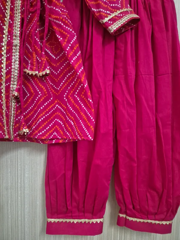 Dark_pink_cotton_angrakha_style_kurti_and_dhoti_set_for_little_girls__