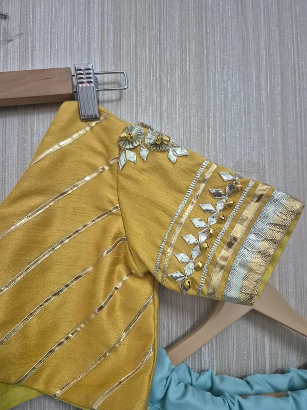 Pastel_blue_and_yellow_handcrafted_lehenga_for_kids