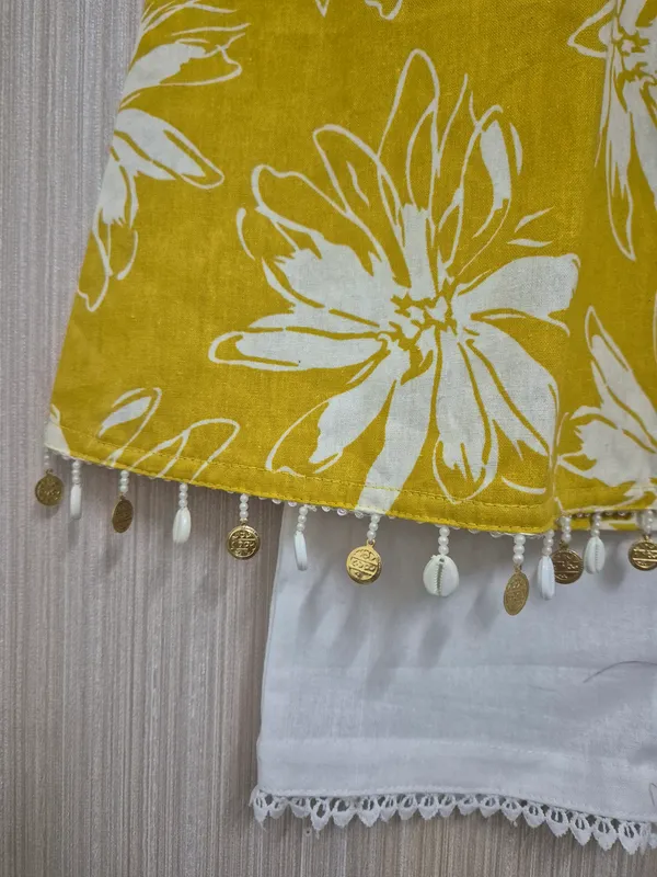 Yellow_cotton_printed_Aline_Kurti_for_girls,_Indian_ethnic_wear