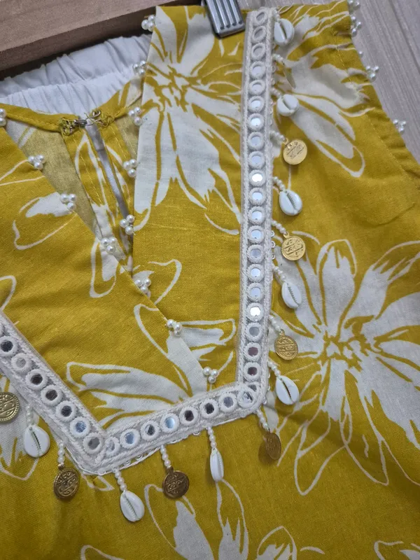 Yellow_cotton_printed_Aline_Kurti_for_girls,_Indian_ethnic_wear