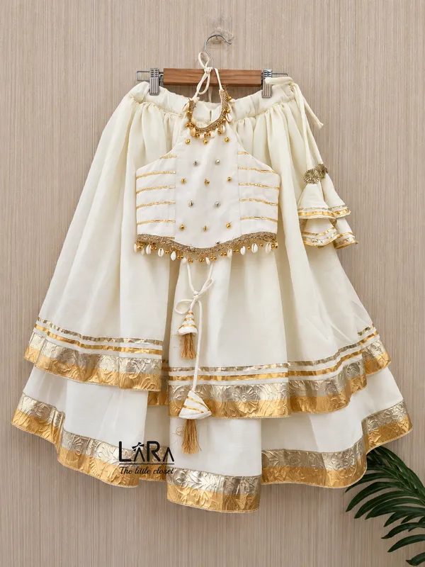 beautiful_off-white_Ghagra_choli_for_little_girls,_halter_neck_blouse,_Indian_festive_wear_