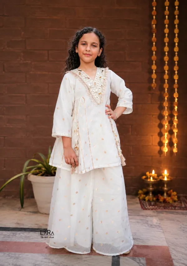Classy_ivory_white_kurti_and_palazzo_set_for_girls,_hand_crafted_design,_festive_wear