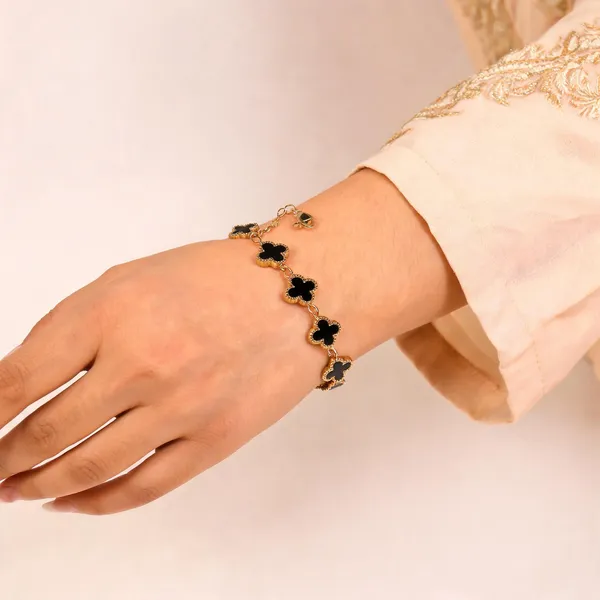 Gold_Toned_Black_Clover_Charm_Bracelet_For_Women