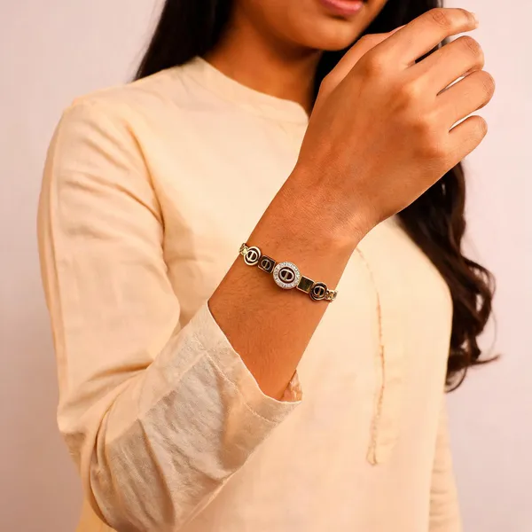 Gold_Toned_Metal_Rakhi_Bracelet_For_Men