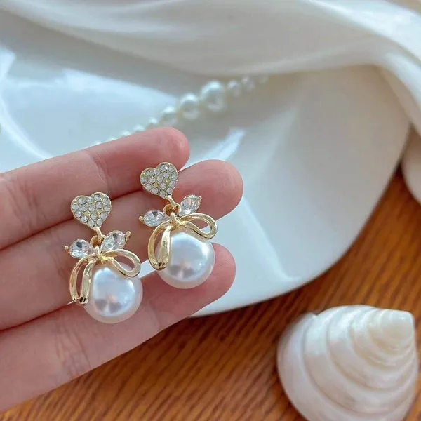 Gold_And_White_Alloy_Drop_Earrings_For_Women_Pack_Of_2