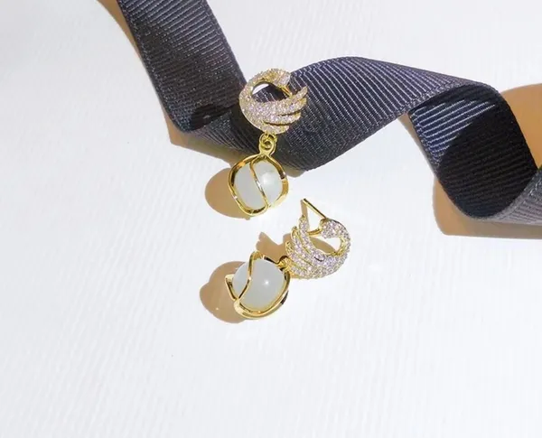 Gold_And_White_Alloy_Earring_For_Women_Pack_Of_2