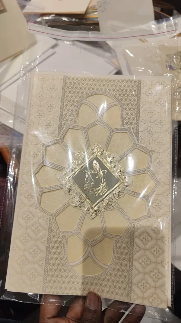 Ivory_Laser_Cut_Floral_Ganesha_Embossed_Wedding_Invitation_Card
