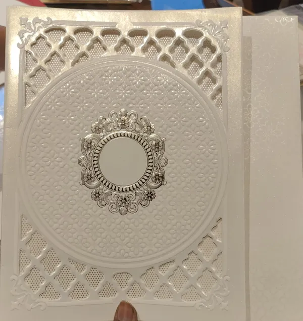 Ivory_Laser_Cut_Floral_Ganesha_Embossed_Wedding_Invitation_Card