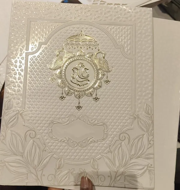 Ivory_Laser_Cut_Floral_Ganesha_Embossed_Wedding_Invitation_Card