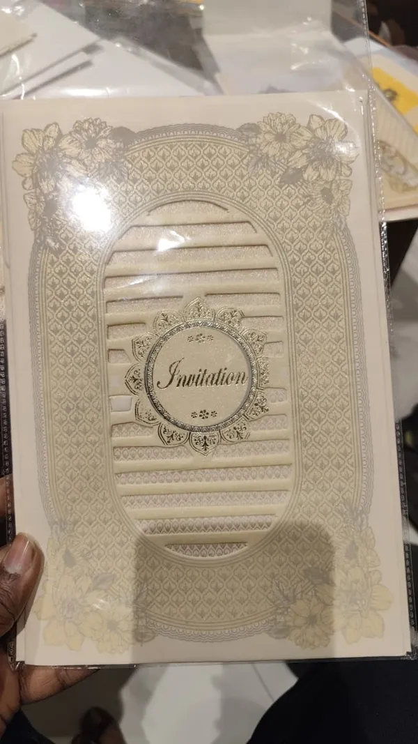 Ivory_Laser_Cut_Floral_Ganesha_Embossed_Wedding_Invitation_Card