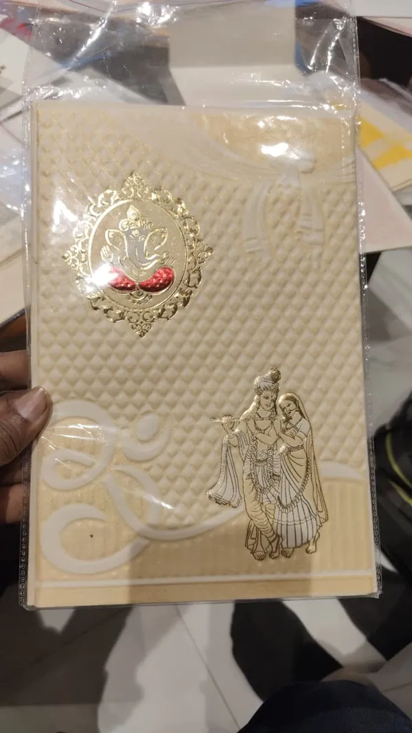Ivory_Laser_Cut_Floral_Ganesha_Embossed_Wedding_Invitation_Card