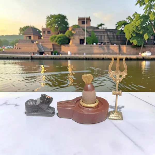Narmadeshwar_Shivling_With_Plat_Jaldhara_Nandi_Trishul_And_Cobra_Nag_Pooja_Set