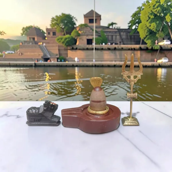 Narmadeshwar_Shivling_With_Plat_Jaldhara_Nandi_Trishul_And_Cobra_Nag_Pooja_Set