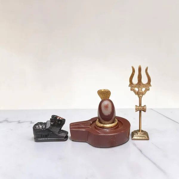 Narmadeshwar_Shivling_With_Plat_Jaldhara_Nandi_Trishul_And_Cobra_Nag_Pooja_Set