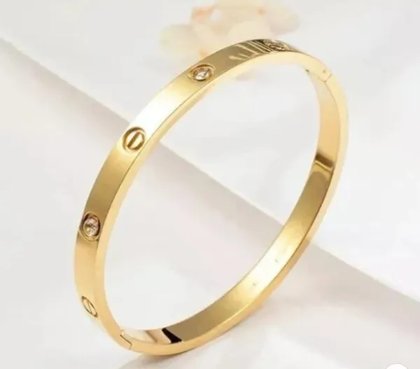Gold_Tone_Screw_Motif_Crystal_Bracelet_for_Women