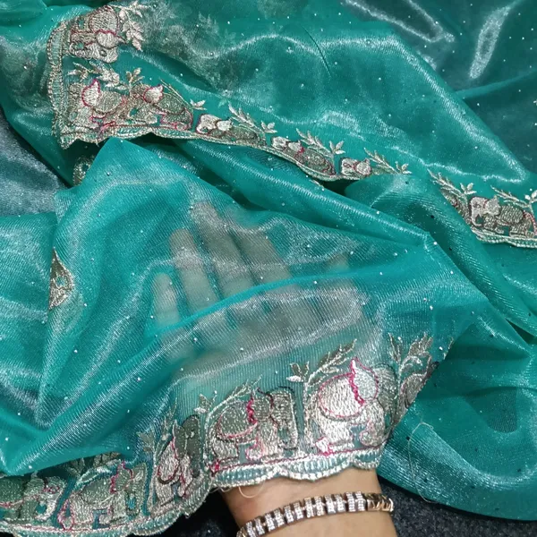 Peacock_Blue_Net_Embroidered_Elephant_Motif_Saree_For_Women
