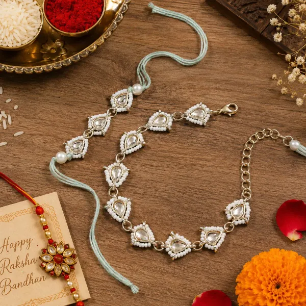 Elegant_Bhaiya_Bhabhi_Lumba_Pearl_&_Rakhi_With_Roli_Chawal_&_Card