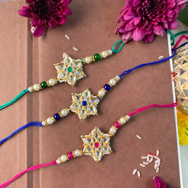 Beautiful_Kundan_&_Pearl_Rakhi_with_Roli_Chawal_&_Card_(Pack_of_3)