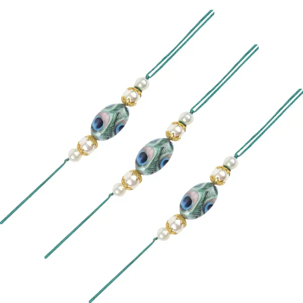 Beautiful_Peacock_Feather_Rakhi_with_Roli_Chawal_&_Card_(Pack_of_3)