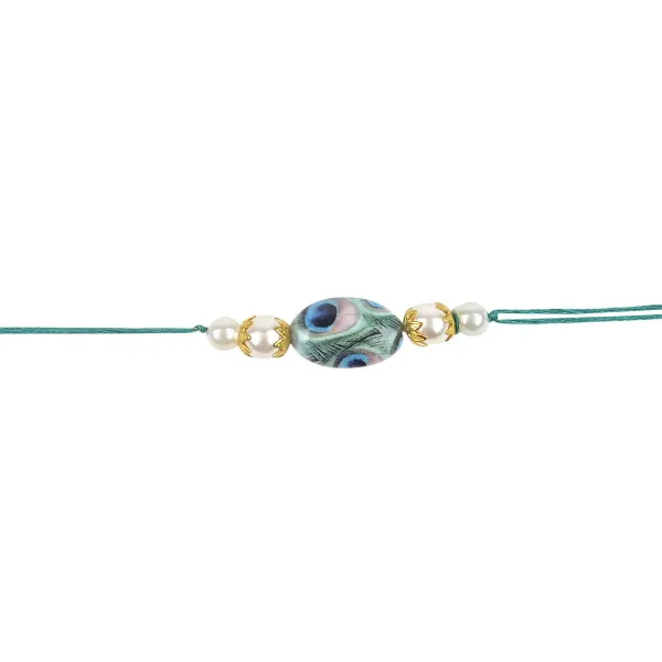 Beautiful_Peacock_Feather_Rakhi_with_Roli_Chawal_&_Card_(Pack_of_3)