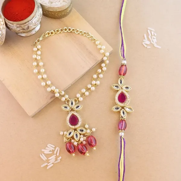 Elegant_Bhaiya_Bhabhi_Lumba_&_Pearl_Rakhi_With_Roli_Chawal_&_Card