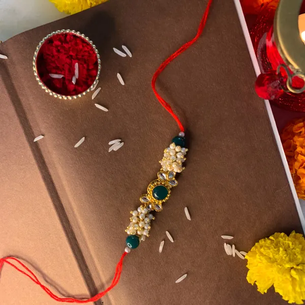 Green_And_White_Thread_Beaded_Rakhi_For_Raksha_Bandhan_For_Brother