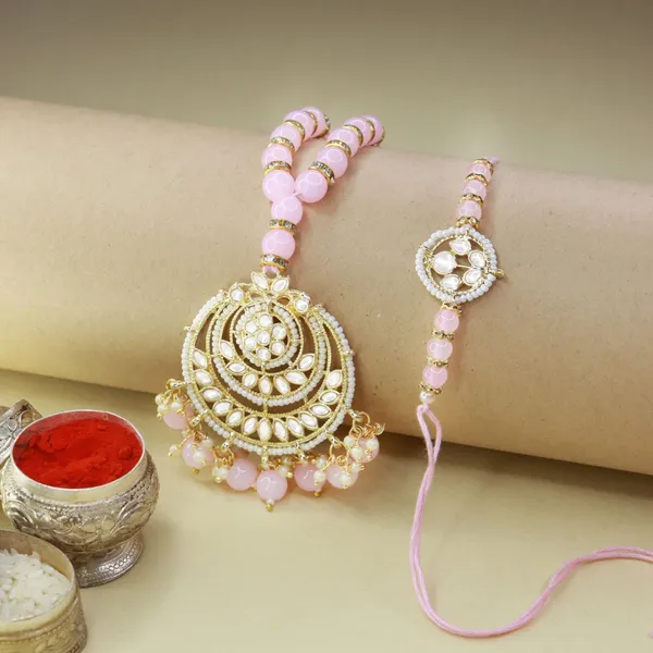 Pink_And_White_Thread_Beaded_Rakhi_For_Raksha_Bandhan_For_Bhaiya_And_Bhabhi