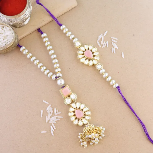 Elegant_Bhaiya_Bhabhi_Lumba_&_Pearl_Rakhi_With_Roli_Chawal_&_Card
