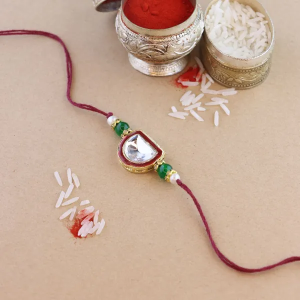 Red_And_Green_Thread_Beaded_Rakhi_For_Raksha_Bandhan_For_Brother