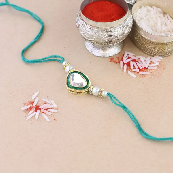 Dazzling_Pearl_Kundan_Stone_Rakhi_with_Roli_Chawal_&_Card