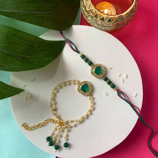 Elegant_Bhaiya_Bhabhi_Lumba_&_Pearl_Rakhi_With_Roli_Chawal_&_Card