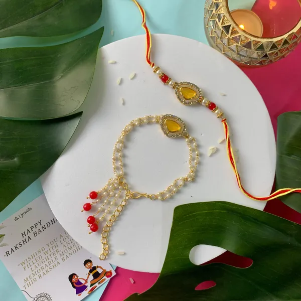 Elegant_Bhaiya_Bhabhi_Lumba_Pearl_&_Rakhi_With_Roli_Chawal_&_Card