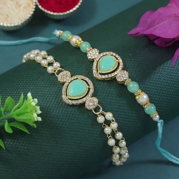 Elegant_Bhaiya_Bhabhi_Mint_Lumba_Pearl_&_Rakhi_With_Roli_Chawal_&_Card