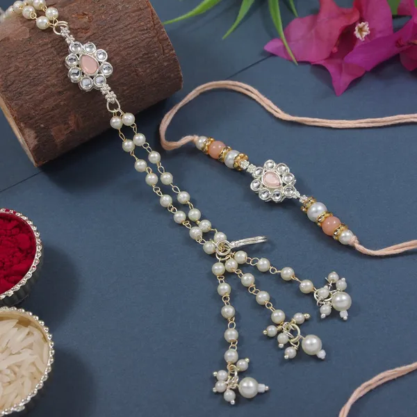 Elegant_Bhaiya_Bhabhi_Peach_Lumba_Pearl_&_Rakhi_With_Roli_Chawal_&Card