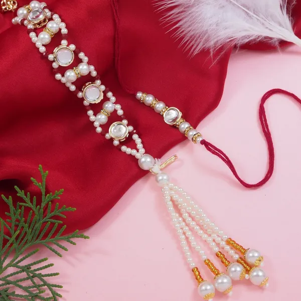 Elegant_Bhaiya_Bhabhi_Red_Lumba_Pearl_&_Rakhi_With_Roli_Chawal_&Card