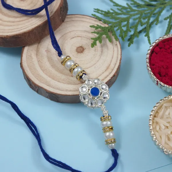 Delicate_Pearl_Beads_Blue_Rakhi_with_Roli_Chawal_&_Rakshabandhan_Card