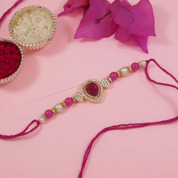 Elegance_Kundan_&_Pearl_Beads_Rakhi_with_Roli_Chawal_&_Card_(Pack_of_4)