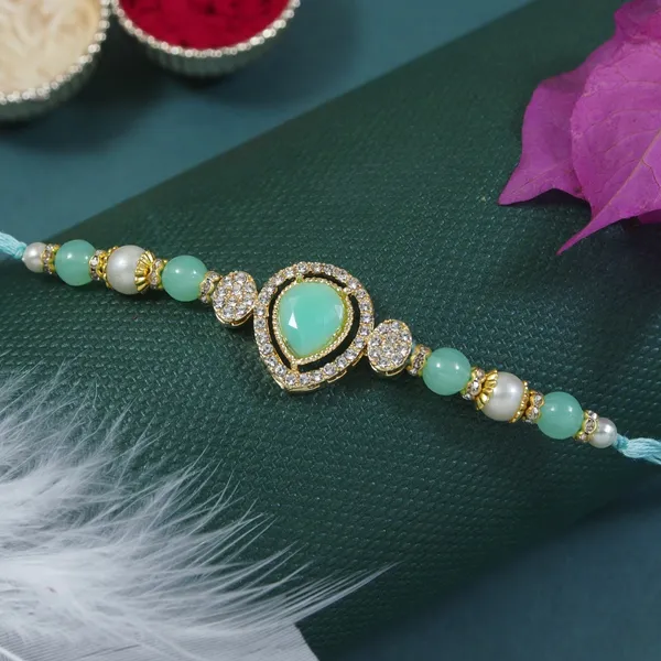 Elegance_Kundan_&_Pearl_Beads_Rakhi_with_Roli_Chawal_&_Card_(Pack_of_4)