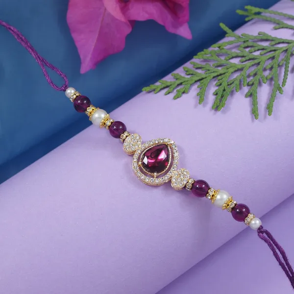 Elegance_Kundan_&_Pearl_Beads_Rakhi_with_Roli_Chawal_&_Card_(Pack_of_4)