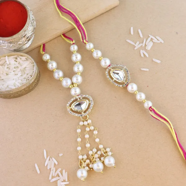 Elegant_Bhaiya_Bhabhi_Lumba_&_Pearl_Rakhi_With_Roli_Chawal_&_Card